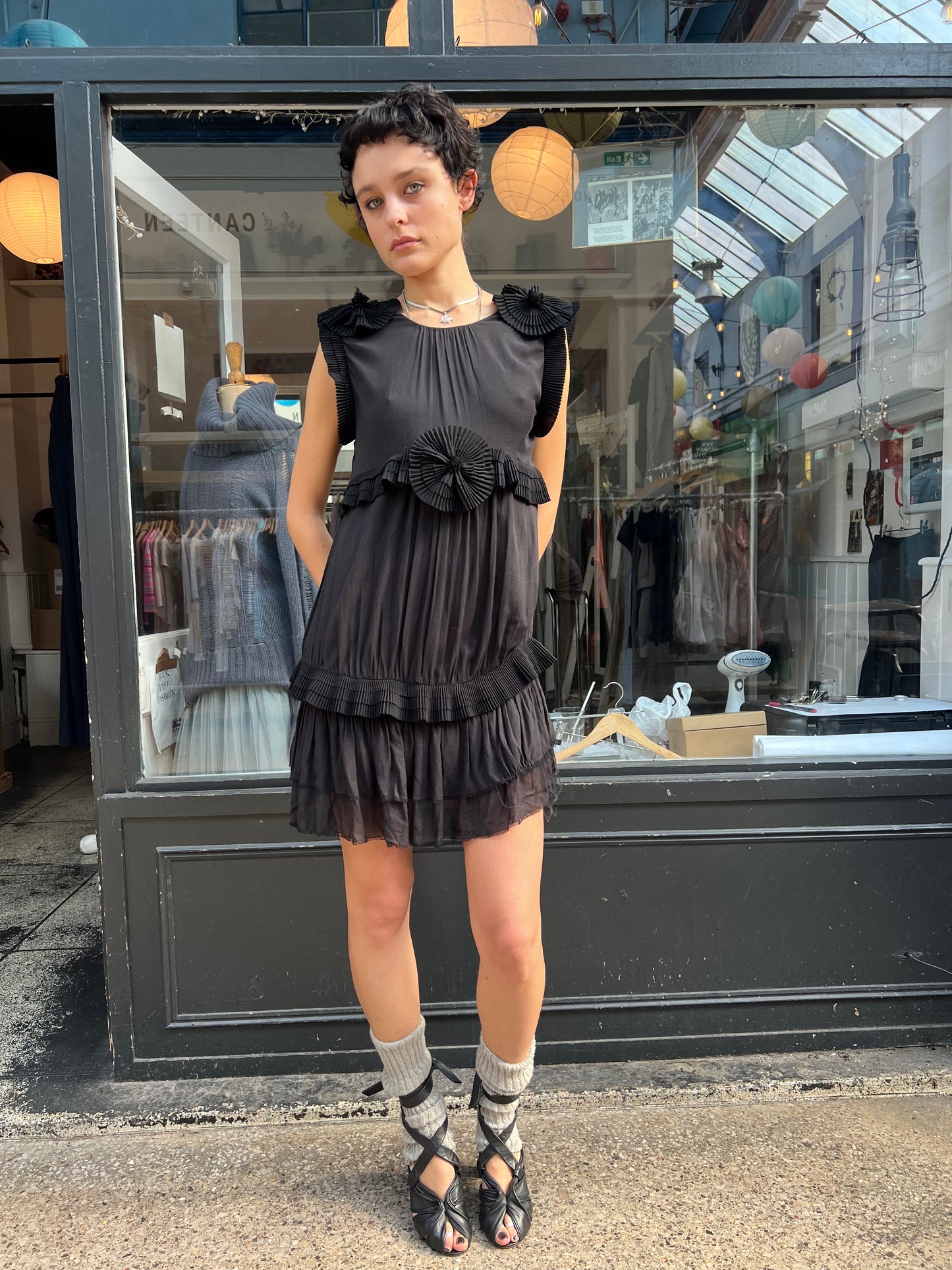 Black mini dress with pleated details