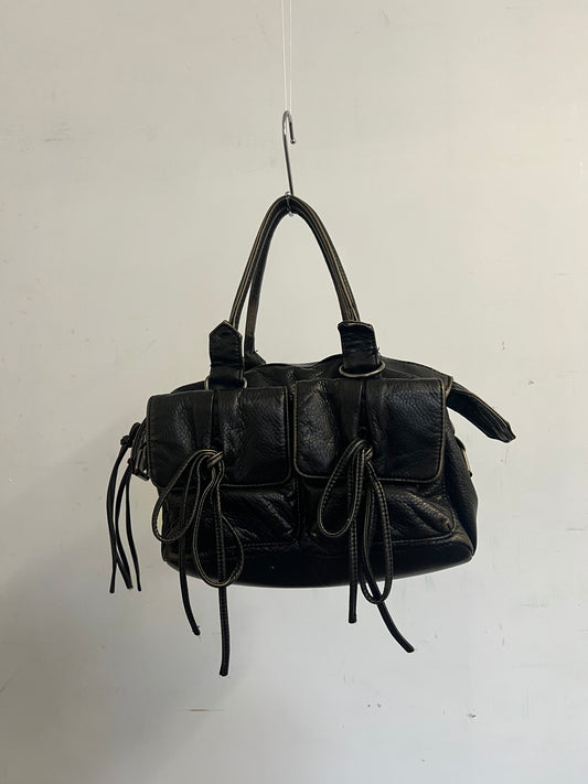 leather bag with bows