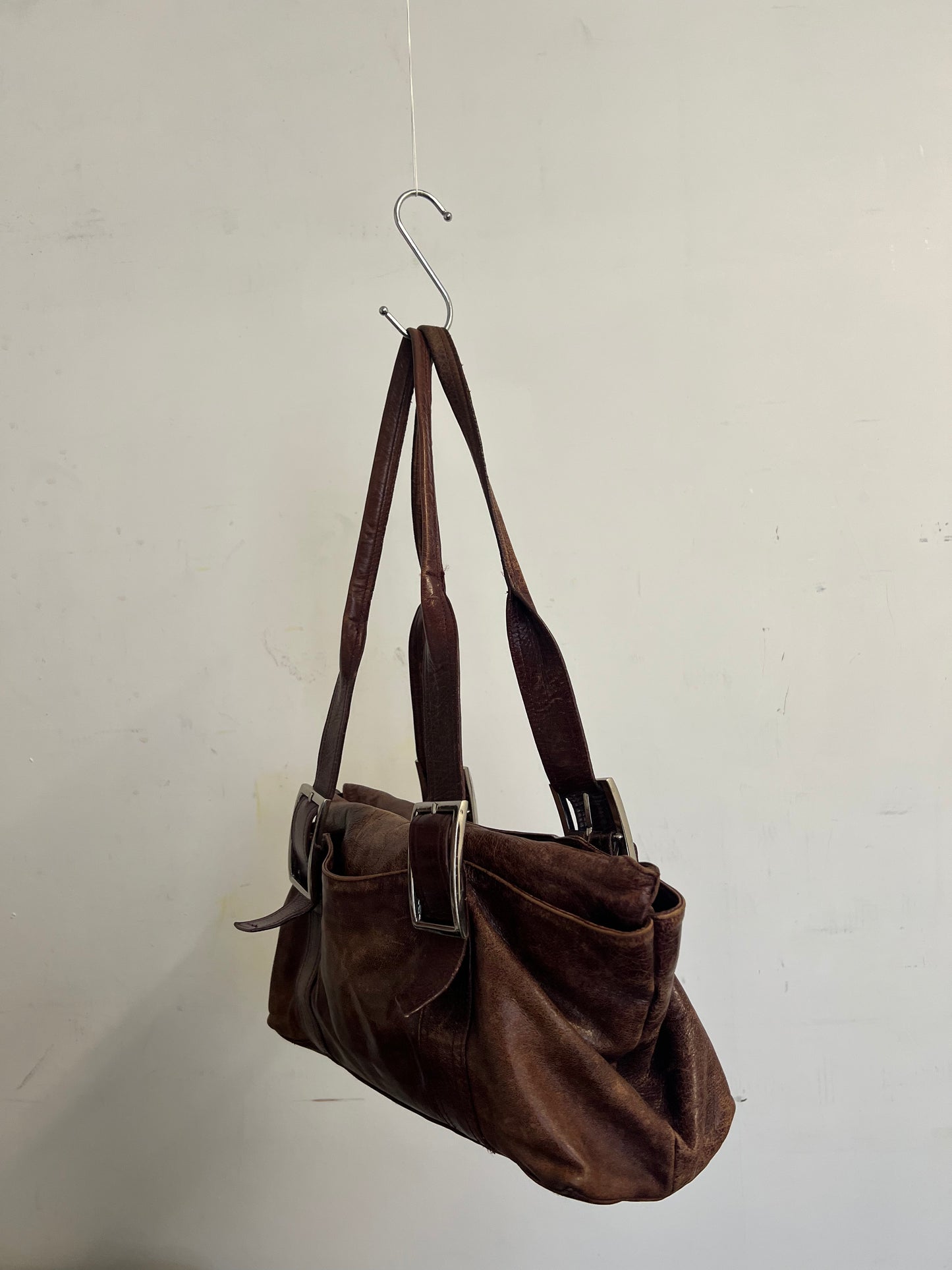 Brown leather baguette bag