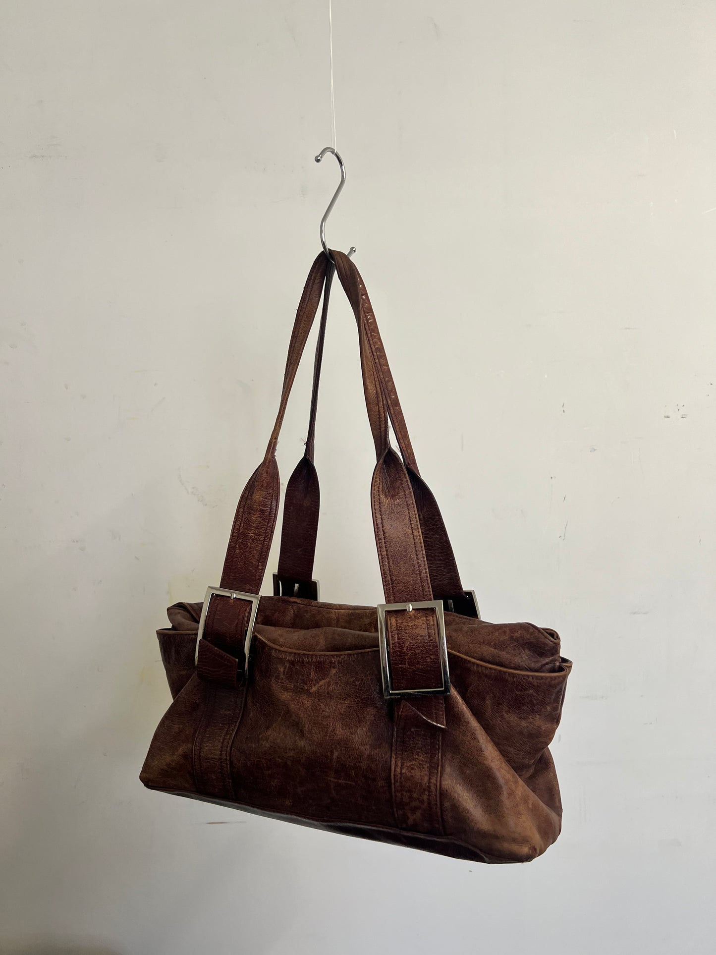Brown leather baguette bag